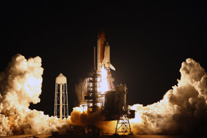 Space shuttle Endeavour lifts off from Kennedy Space Center March 11, bound for the International Space Station. (© AP Images)