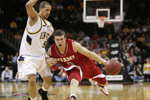 Miami's Alex Moosmann, right, tries to get past Kent State's Al Fisher during a Mid-American Conference tournament semifinal basketball game Friday, March 14, 2008, in Cleveland. (AP Photo/Mark Duncan)