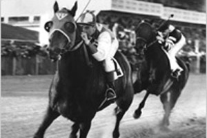 The exploits of legendary racehorse Seabiscuit (foreground) are vividly recreated in the 2003 film named for him. (© AP Images)