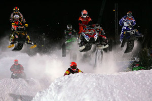 Snowmobilers compete in a SnoCross competition at the Winter X Games near Aspen, Colorado. (© AP Images/Nathan Bilow)