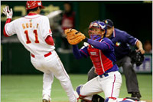 Catcher Zhenwang Zhang of China will soon be playing for the New York Yankees. (© AP Images)